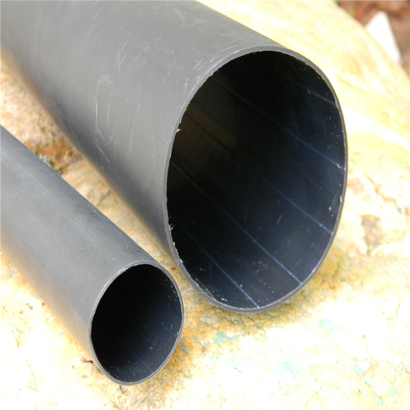 Medium and heavy wall tube with adhesive